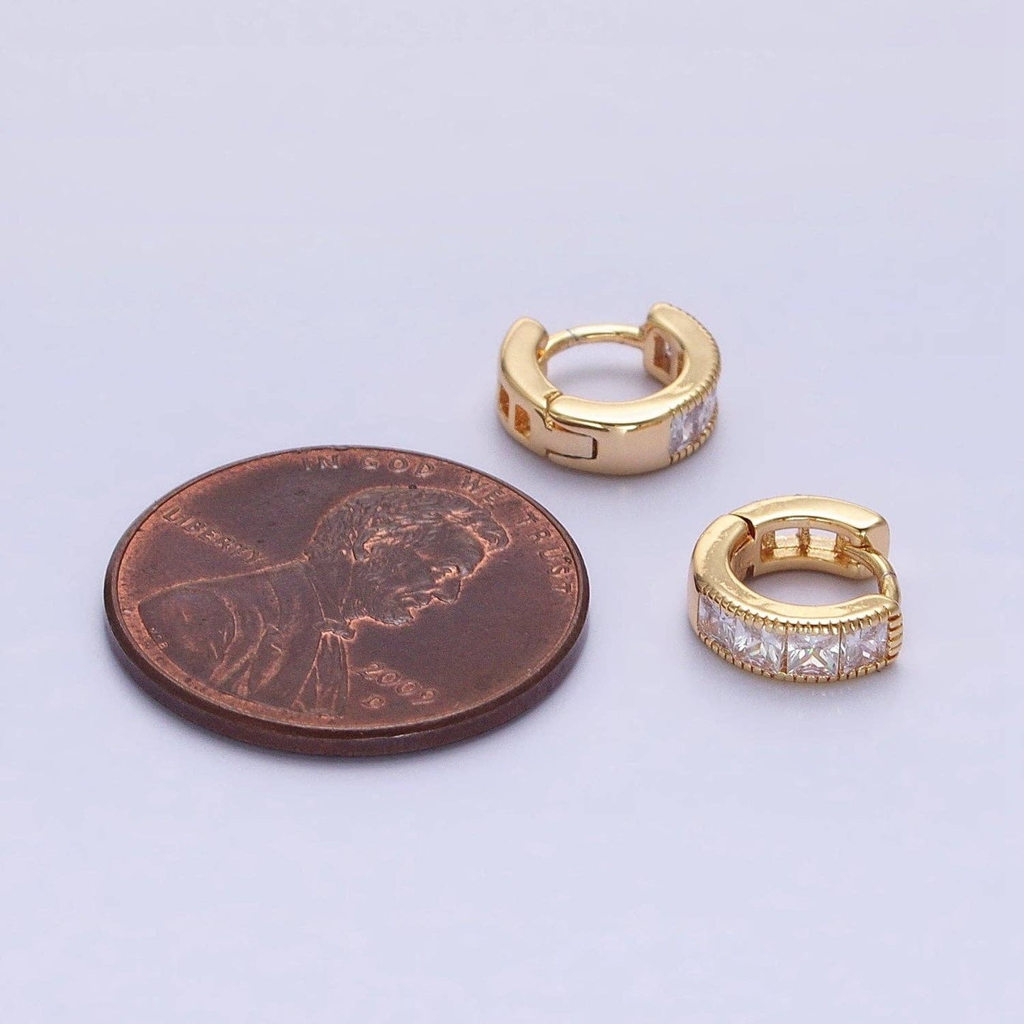 Tiny Huggie Earrings-Clear